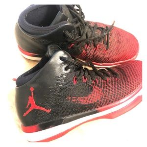 red and black jordans high tops